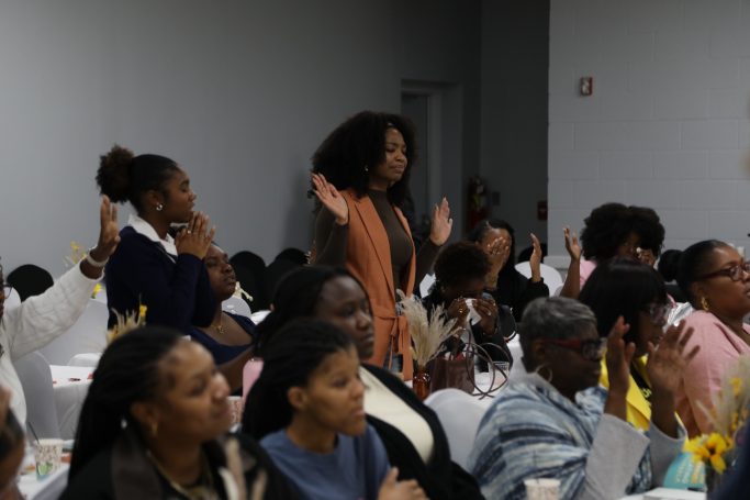 Women gathering in faith at Purposed Women